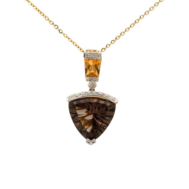 A lovely and unique model by designer Bellarri, a pendant necklace showcasing a 10.91-carat shield smokey quartz with a...