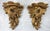 An ornate pair of carved giltwood wall brackets. Made in france in the 19th century. Each one features a hand carved pair...