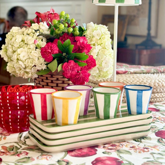 Hand-painted ceramic stoneware collection crafted in a historic factory in Civita Castellana Italy, a village where...