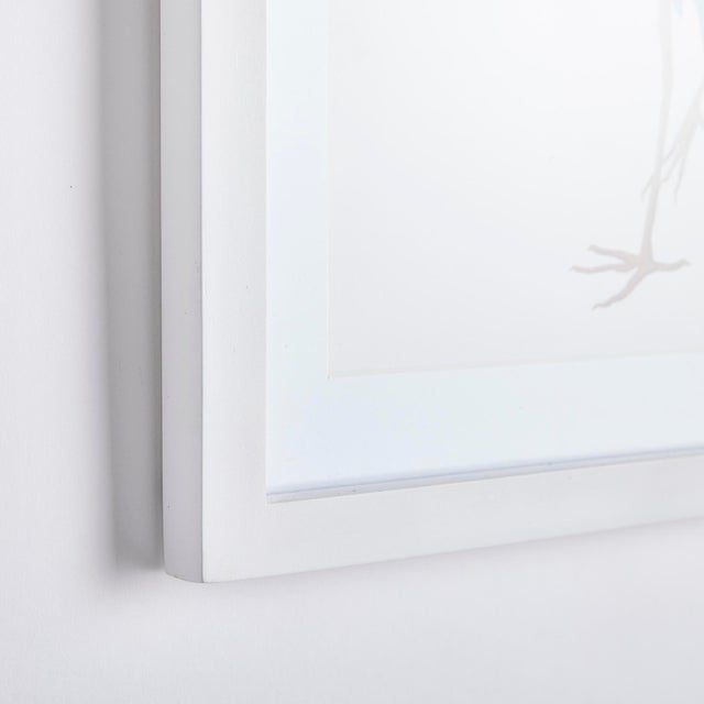 These simplified blue heron prints are complemented with simple white wood frames. This coastal-inspired set of six was...