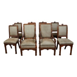 Set of Eight 1920s Black Forest Dining Room Chairs with Hand-Carved Floral Décor For Sale