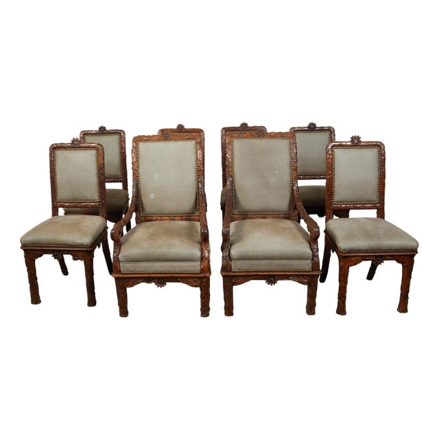 Set of Eight 1920s Black Forest Dining Room Chairs with Hand-Carved Floral Décor For Sale