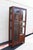 Elegant Asian-inspired rosewood curio display cabinet, beautifully crafted with clean architectural lines and warm wood...