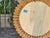 French giltwood craftsmanship meets sculptural flair in this striking round mirror dating to the 1920s. The radial frame...
