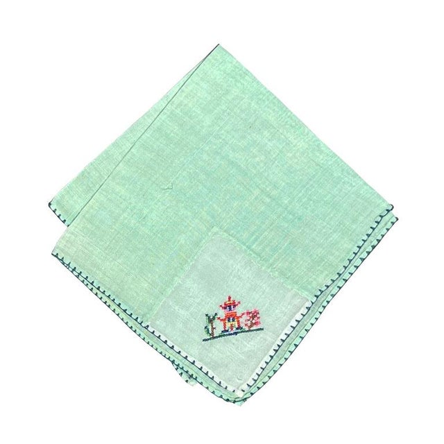 A set of five chinoiserie mint green hand-stitched and embroidered table napkins. This set of mid-century table linens...