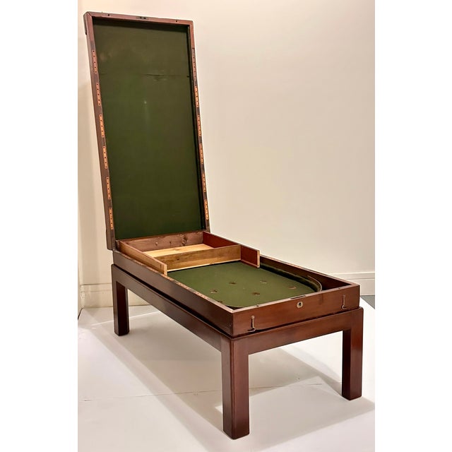 This exquisite 19th-century "Bagatelle" game coffee table is crafted from beautiful mahogany, showcasing a rich, deep...