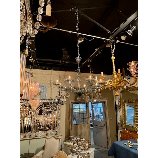 Modern Murano glass 8-arm chandelier in Fontana Green. Circa 2000. The chandelier has been professionally rewired, comes...