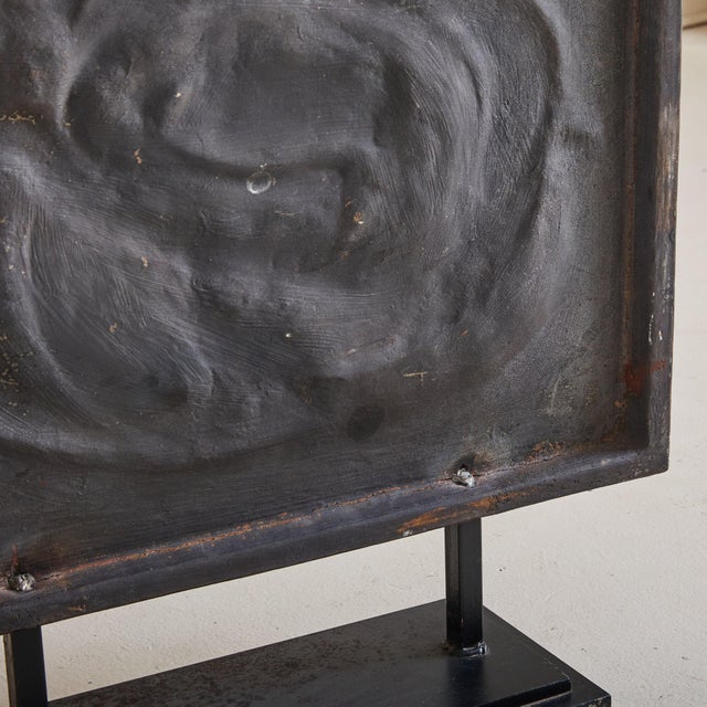 This striking cast iron sculpture by renowned French artist René Coutelle embodies his mastery of form and texture....