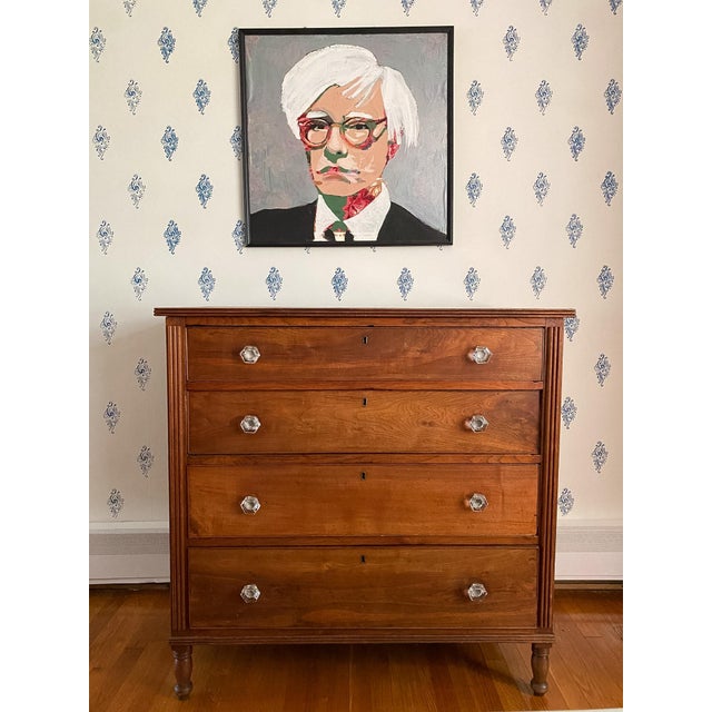 The swirling walnut wood grain and the bold reeding on the sides of this chest give it a distinctive personality. Along...