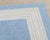 Contemporary Blue and White Indoor / Outdoor Woven Rug. 7' 6" L x 5' 3" W. Provenance: From a Connecticut Estate.