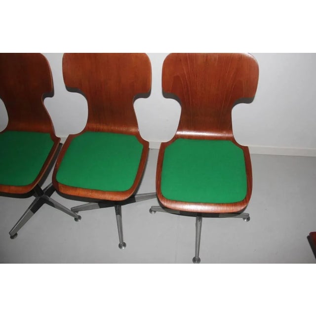 This set of four Italian desk chairs was designed by Carlo Ratti and is in original condition.