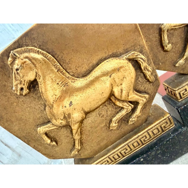 Hollywood Regency Rare 1930’s Italian Regency Equestrian Bookends by Borghese With Horse & Greek-Key Design in Gold Gilt on a Black Faux Granite Base- A Pair For Sale - Image 3 of 12