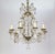 A beautiful and well-balanced French, white-gold over iron chandelier from the mid-19th century; decked with massive rock...