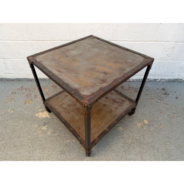 Bring a bold, authentic factory aesthetic into your living space with this Industrial 2-Tier Accent Table. Perfectly...