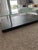 Glass and wood coffee table designer by Pascal Mourgue. In excellent condition. Modern style with quality craftsmanship.