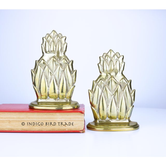 Vintage Pair of Brass Pineapple Bookends These adorable bookends are made from solid brass in beautiful pineapple design....