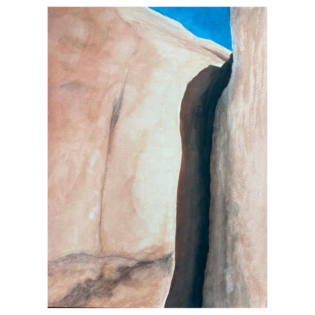 The desert light reflecting on an enormous rock wall in Joshua Tree National Park. This is an original watercolor painting.