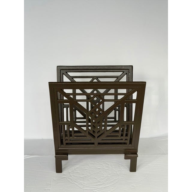 We are very pleased to offer this vintage magazine rack inspired by Frank Lloyd Wright’s iconic Lake Geneva Hotel tulip...