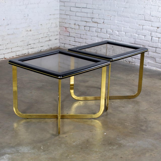 Marvelous vintage Modern or Mod Style end or side tables 1 rectangular & 1 square composed of black painted wood tops with...