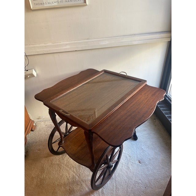 Beautifully crafted antique butler’s cart in perfect condition. Removable glass tray protects top and provides flexible...