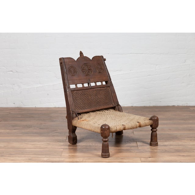 Brown Antique Indian Rustic Low Seat Wooden Chair With Carved Rosettes and Twine Seat For Sale - Image 8 of 14