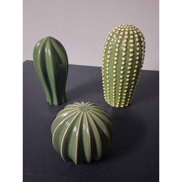 Super cool 3-Pc cactus set. These are glazed stoneware & have the coolest, minimalist look that will mesh with many decor...