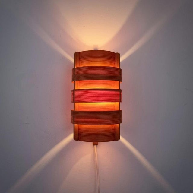 Well-kept pine wall light / sconce designed by Hans-Agne Jakobsson, Ellysett Markaryd, Sweden. Swedish Modern / Mid-...