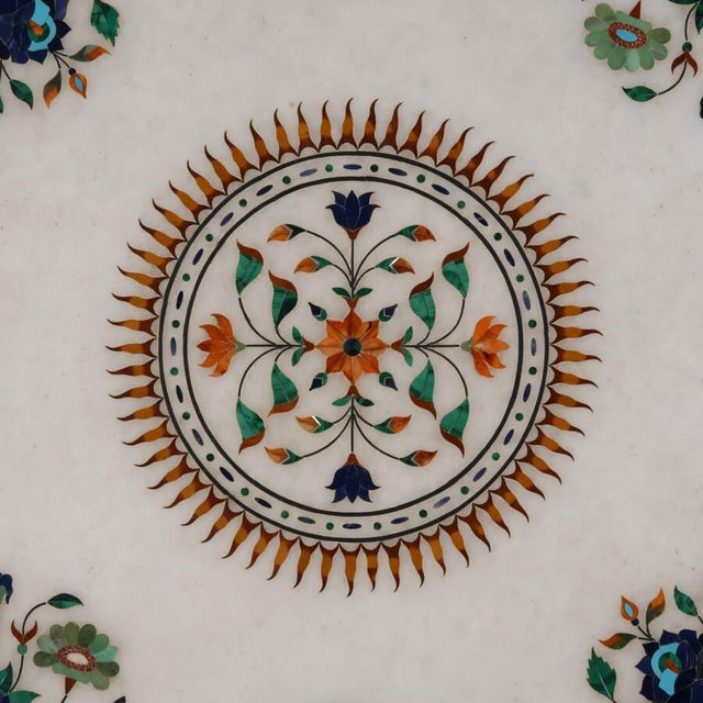 This Vintage Octagon Marble and Pietra Dura Inlaid Tabletop is a breathtaking example of fine craftsmanship and timeless...