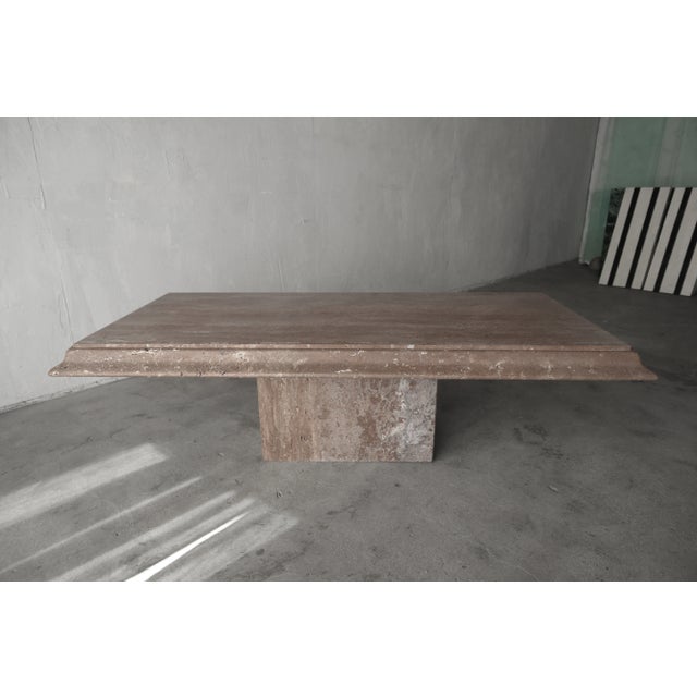 Make a huge statement with this beautiful brown travertine coffee table. Table is a beautiful design, with lovely brown...