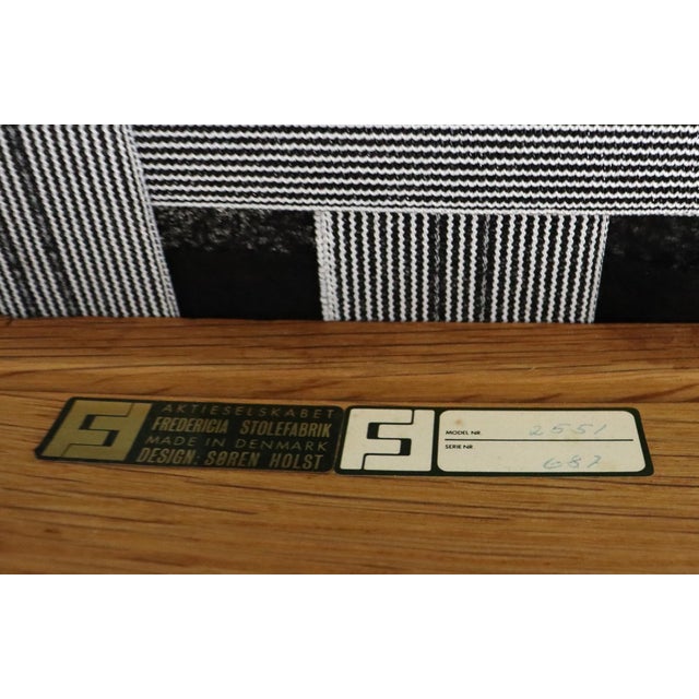 Completely restored armchair, model 2551, designed by Søren Holst for Frederica Stolefabrik. This Danish armchair is made...