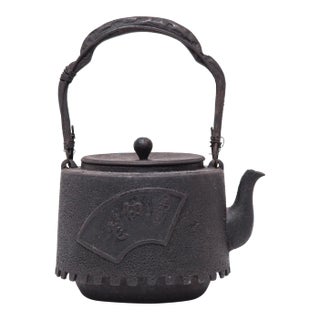 "Fanning the Fire" Antique Japanese Iron Teapot, C. 1920s For Sale