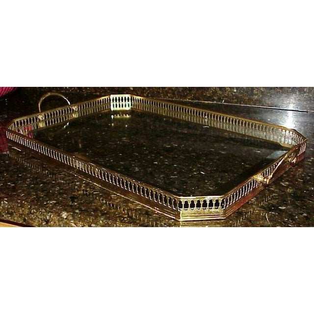1950's Maison Bagues Paris solid brass framed with mirrored glass insert serving tray. One and a half inch mirrored band...
