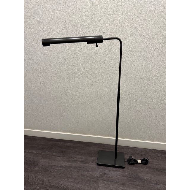 Handmade in America from solid brass, this sleek, minimalist floor lamp is a versatile fit for a living room, home office,...