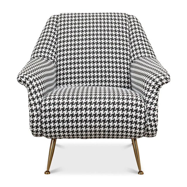 Mid Century style armchair with houndstooth on linen fabric, tightly upholstered cushion backrest, and seat, raised on...