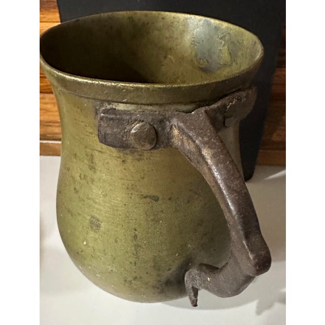 This is a jug or olleta and it was made for melting chocolate to drink but making coffee in it also works! I can't speak...