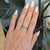 This elegant band features vibrant Zambian emerald stones set in a sleek minimalist design, crafted in solid 14K gold. The...