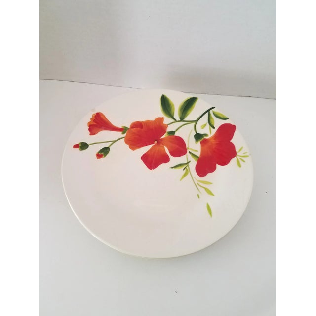 Vintage "Garden Bouquet Home Studio" ceramic floral dinner plates. Each plate displays a vivid floral design. What a...