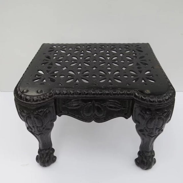Cast iron cabriole leg footman. Pierced top. Cabriole front legs. These are great for small side tables... Note:Trivets...