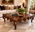 A striking oversized coffee table attributed to Marge Carson, distinguished by its dramatic sculptural form and generous...