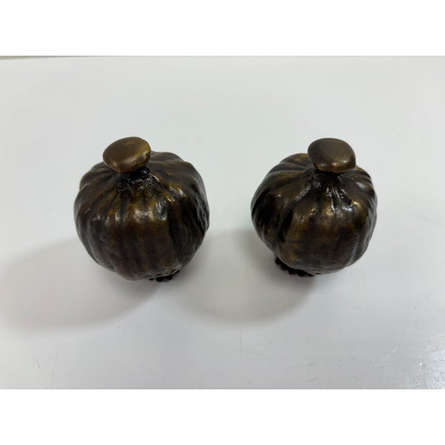 Pair of rare and charming Michael Aram bronze gourd salt and pepper shakers. Beautifully sculpted with removable bases to...
