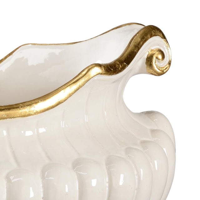 Create an alluring centerpiece for your dining room table or buffet with our Oval Pot. This 12.5" oval pot is crafted of...