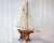 Made in England in the twentieth century, this wooden pond yacht is rigged as a gaff cutter. Models of this kind were...