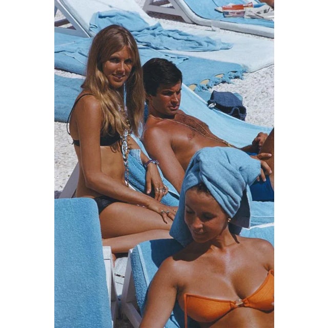 George Hamilton And Alana Collins 1968 by Slim Aarons Slim Aarons Limited Estate Edition American actor George Hamilton...