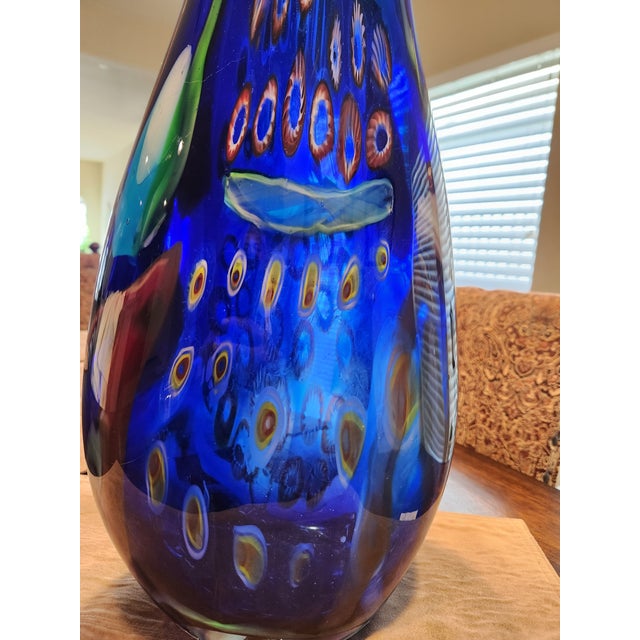 Elevate your home decor or art collection with this breathtaking, verified authentic Murano glass vase. Standing an...