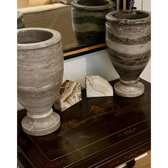 A handsome marble vase with greige-toned patterns. The perfect accessory for tricky areas like kitchens (especially...