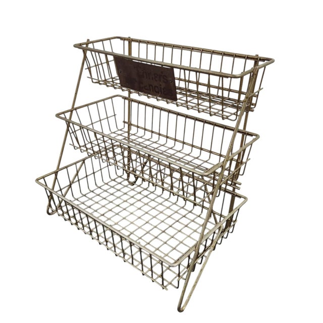 Authentic and full of charm, this vintage 3-tier wire display rack was originally used to merchandise Ehrler’s Candies in...