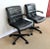 A pair of leather office chairs dating from 1979 and designed by the German industrial designer, Richard Sapper...