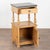 Early 20th century small nightstand, crafted in pine with an old marble top. This cabinet features one small drawer above...