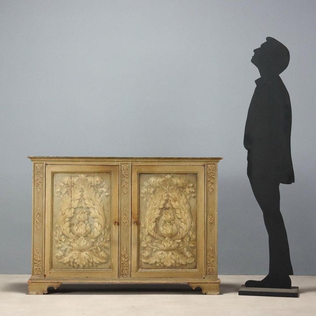 Baroque style sideboard crafted from fir and poplar, featuring refined leaf compositions. The front showcases a pair of...