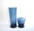 A pair of vintage, mid-century, hand-blown cobalt blue crystal glass vases with a slight tapering on the tall vase and...